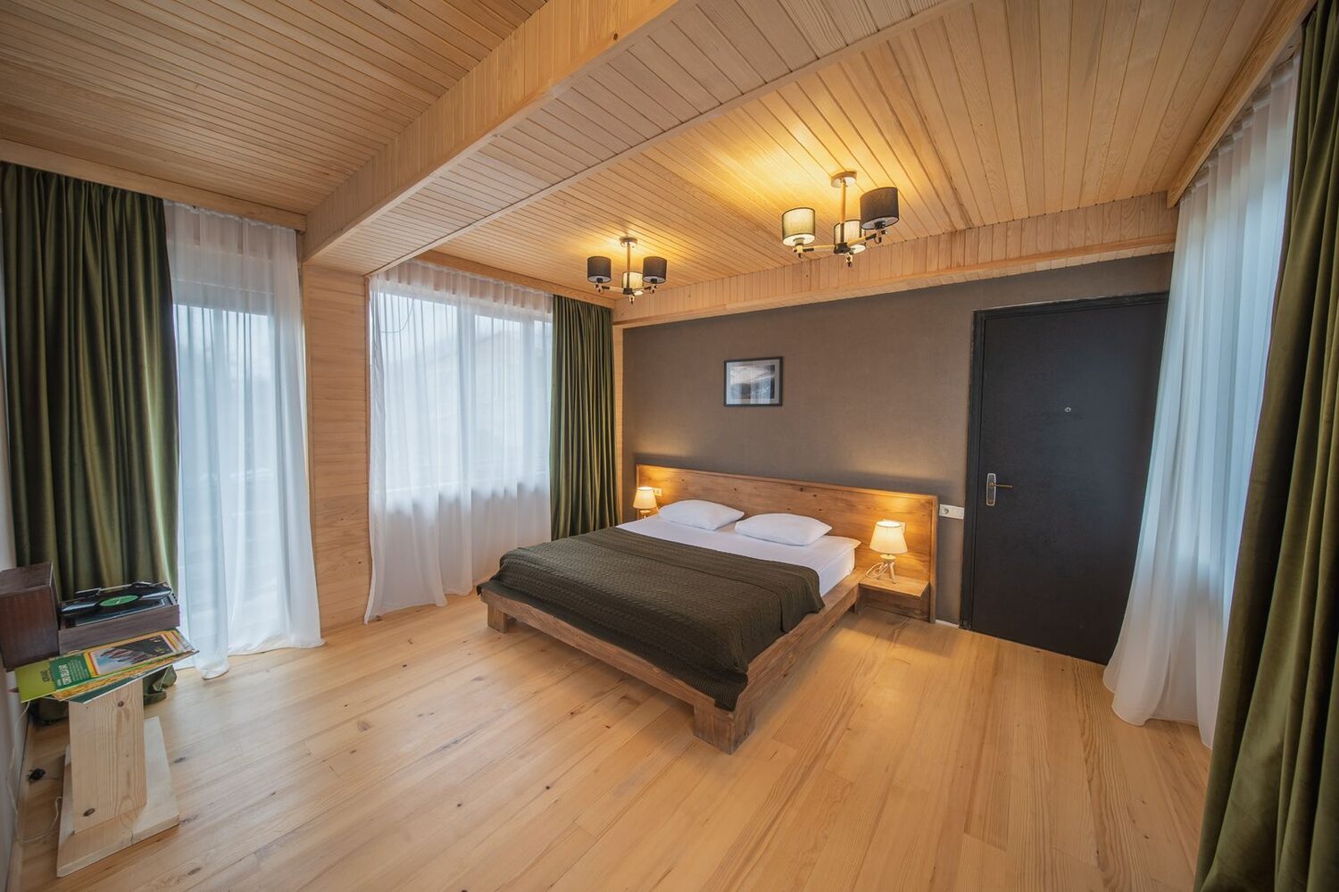 Twin room with wood ceiling